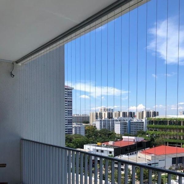 High-quality invisible balcony and window grills in Vijayawada installed by Neeraj Safety Nets for modern home safety.